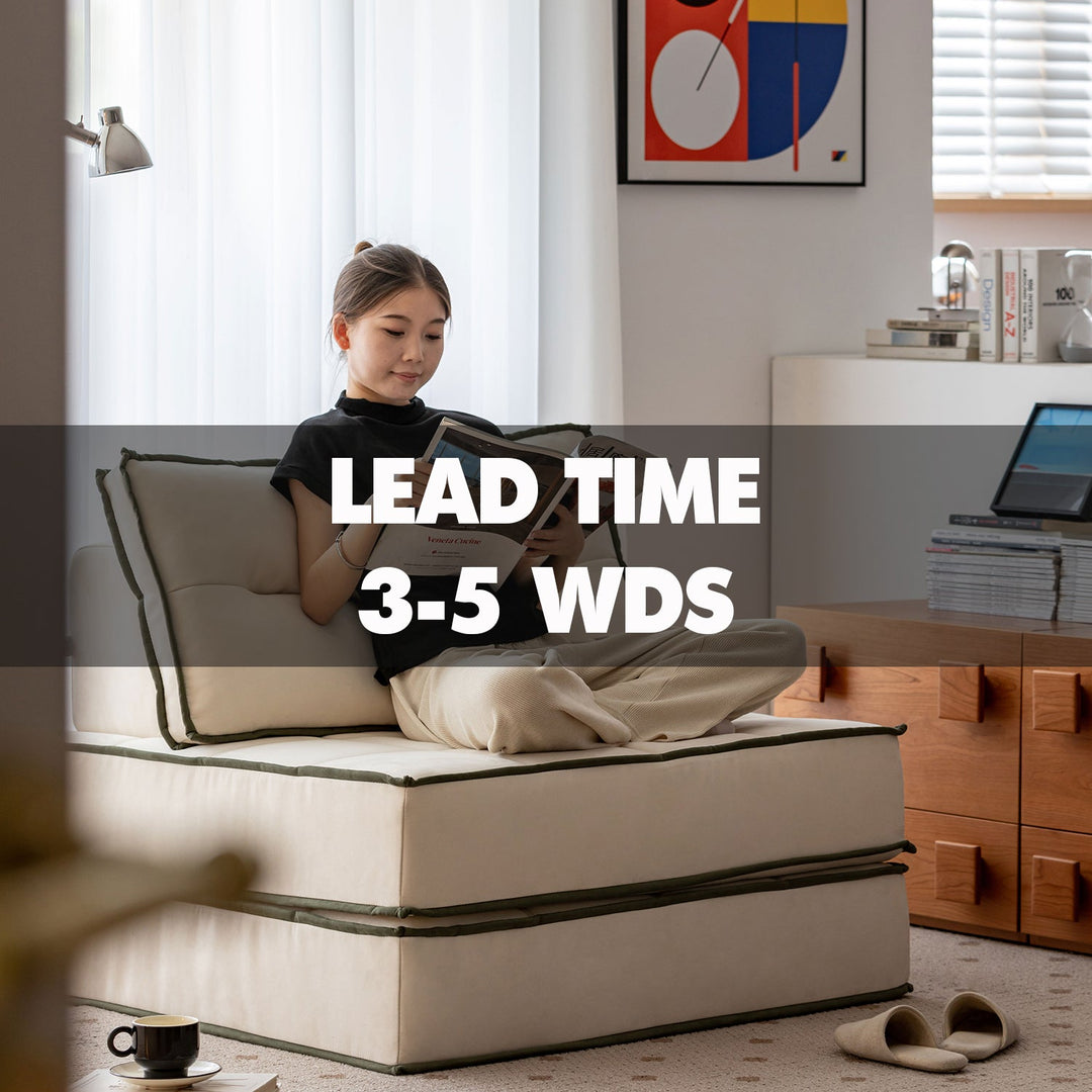Girl relaxing on a foldable cushioned chair in a cozy room, showcasing Loft Home’s 3-5 working days lead time furniture collection in Singapore.