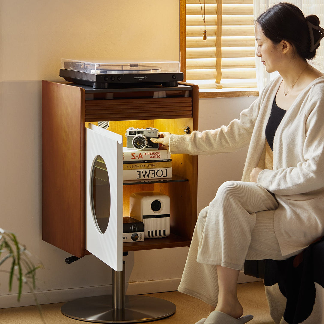 Compact wooden storage cabinet with LED-lit shelves and round mirror door, styled for multifunctional use, ready in stock now.