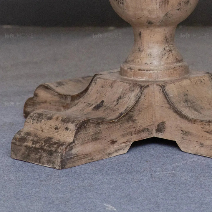 Rustic pine wood round dining table willow in panoramic view.