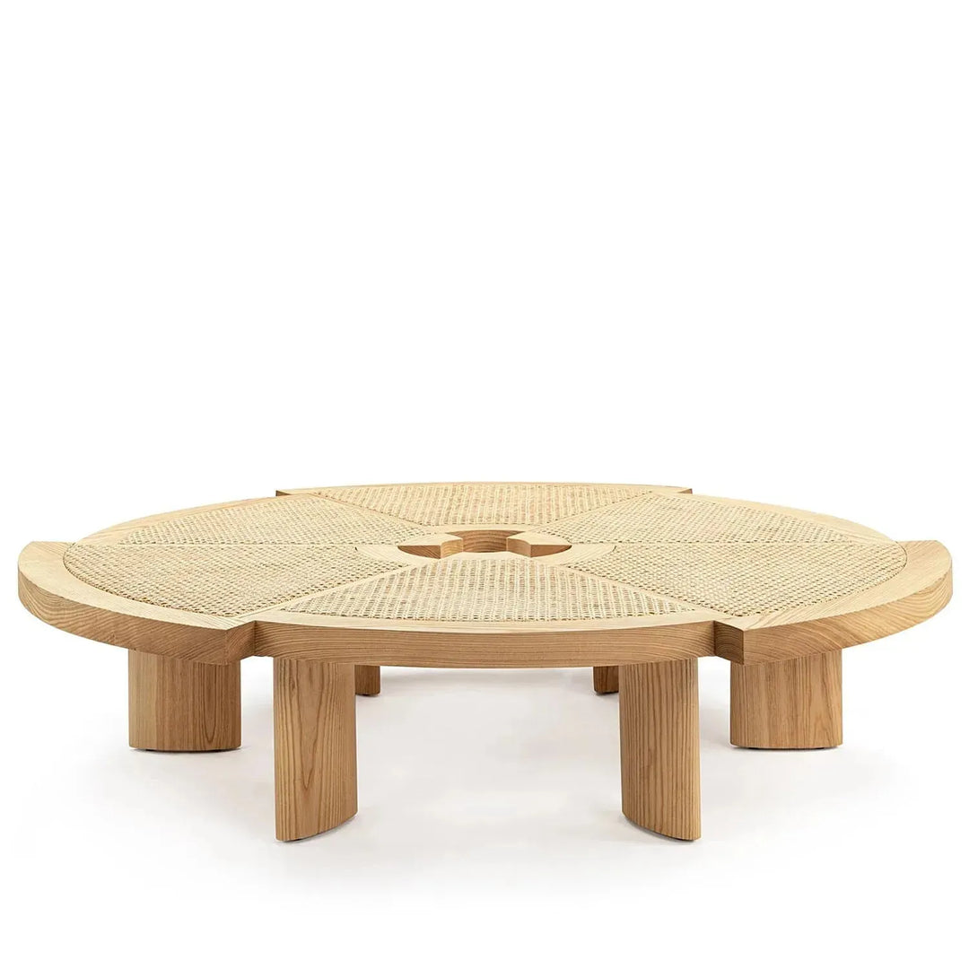 Scandinavian rattan coffee table rio in white background.