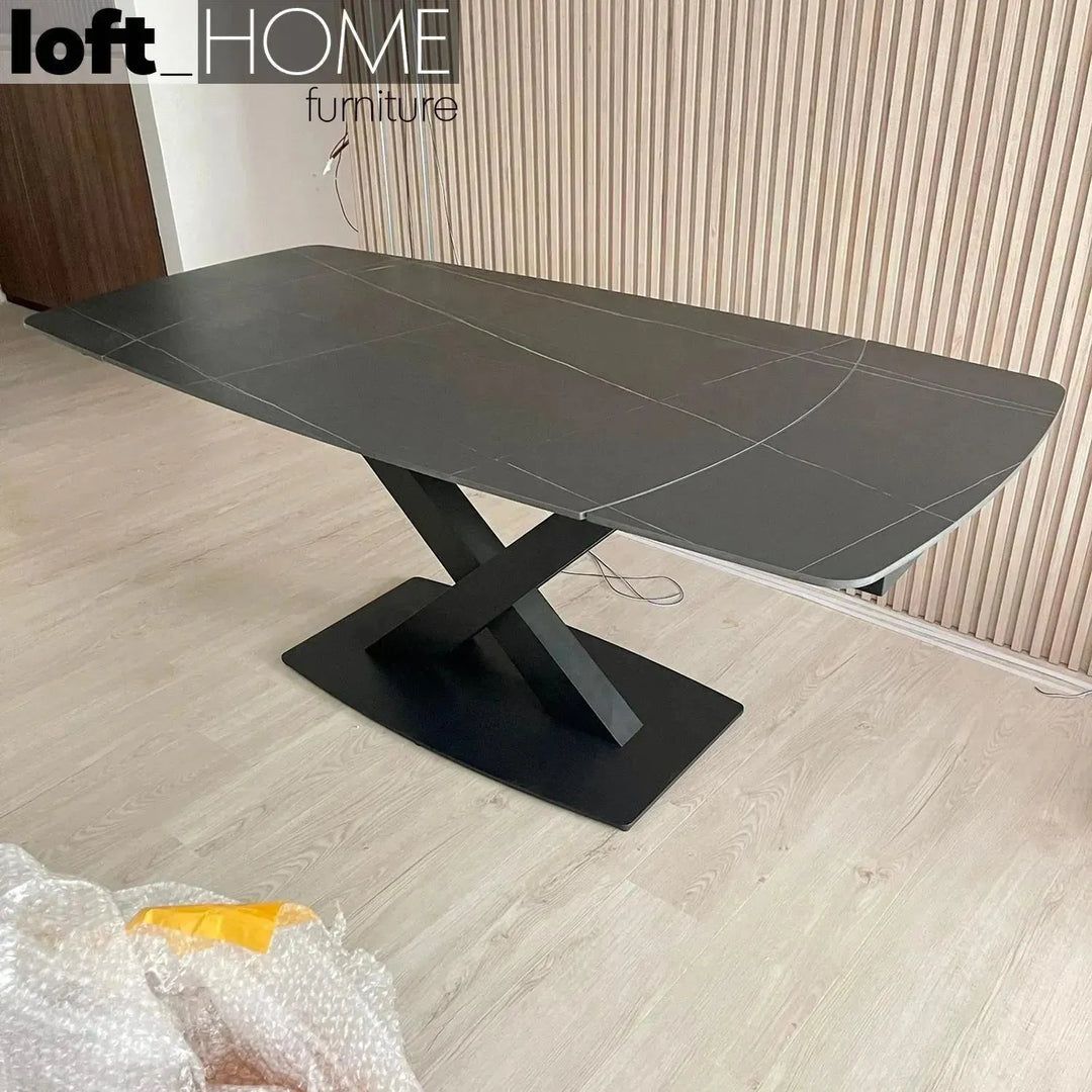 Modern extendable sintered stone dining table luvia in panoramic view.