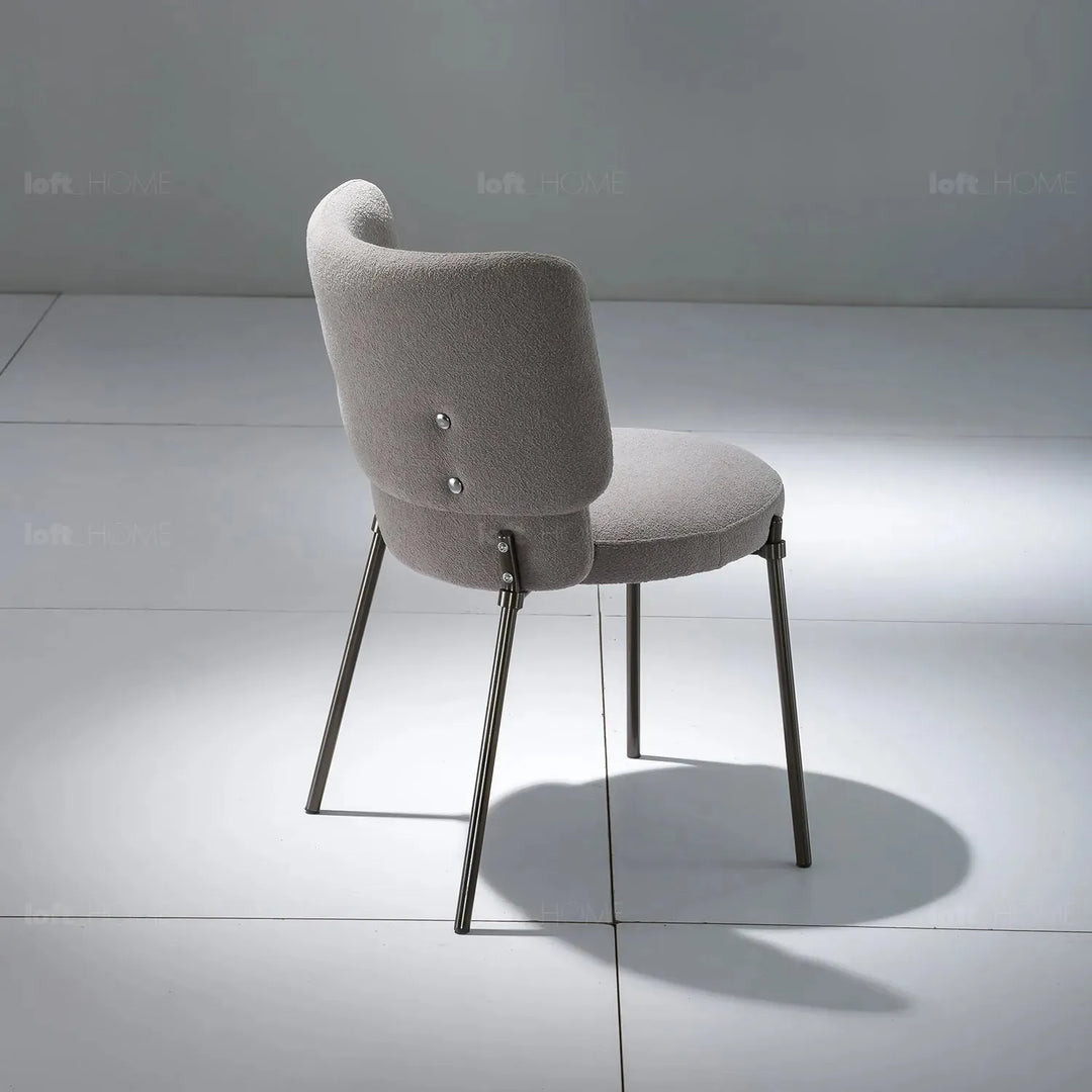 Modern fabric dining chair cloud with context.