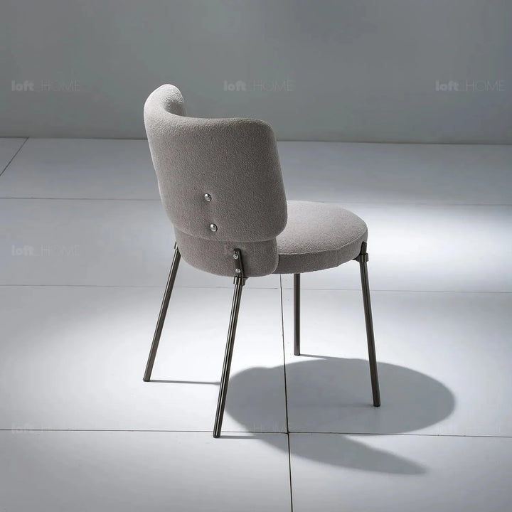Modern fabric dining chair cloud with context.