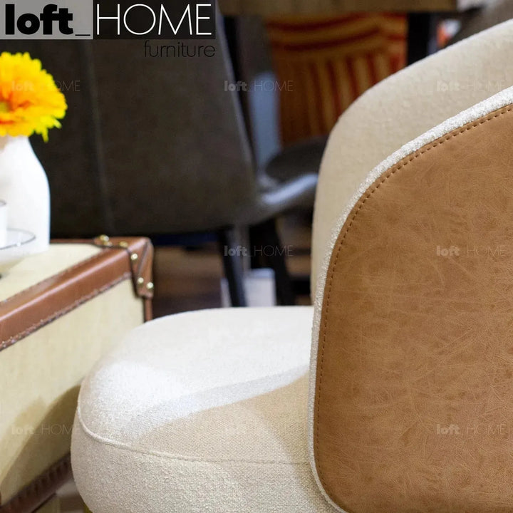 Modern fabric and leather dining chair metal man n13 in close up details.