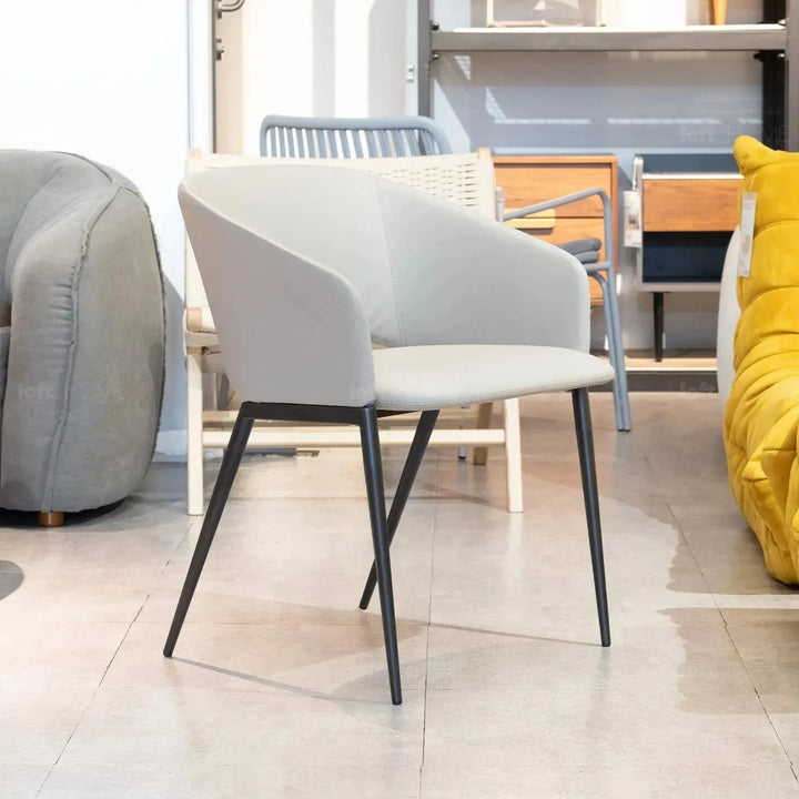 Modern fabric and leather dining chair metal man n16 in real life style.