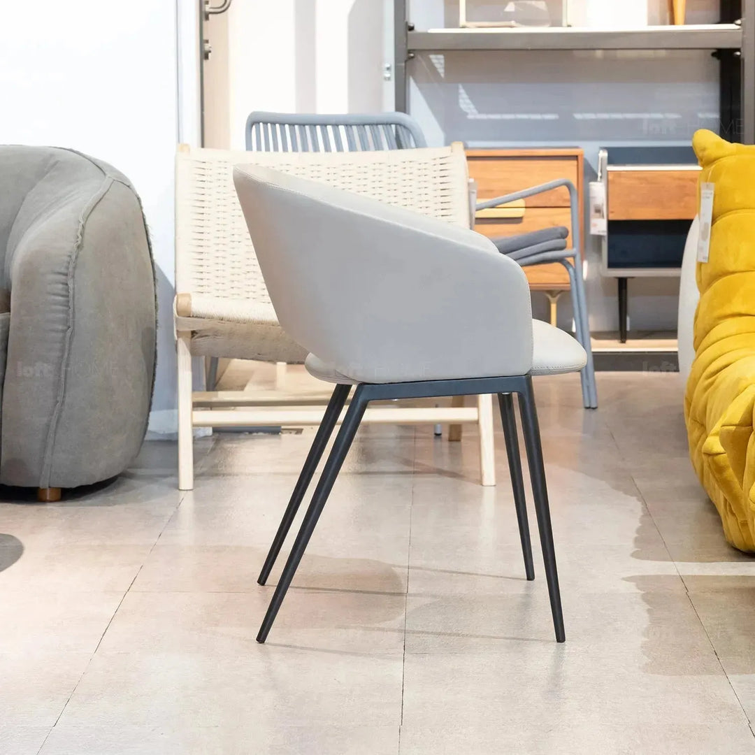 Modern fabric and leather dining chair metal man n16 in details.