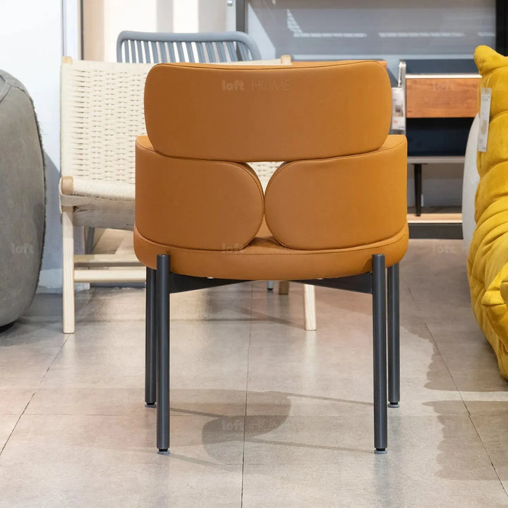 Modern fabric and leather dining chair metal man n19 in close up details.