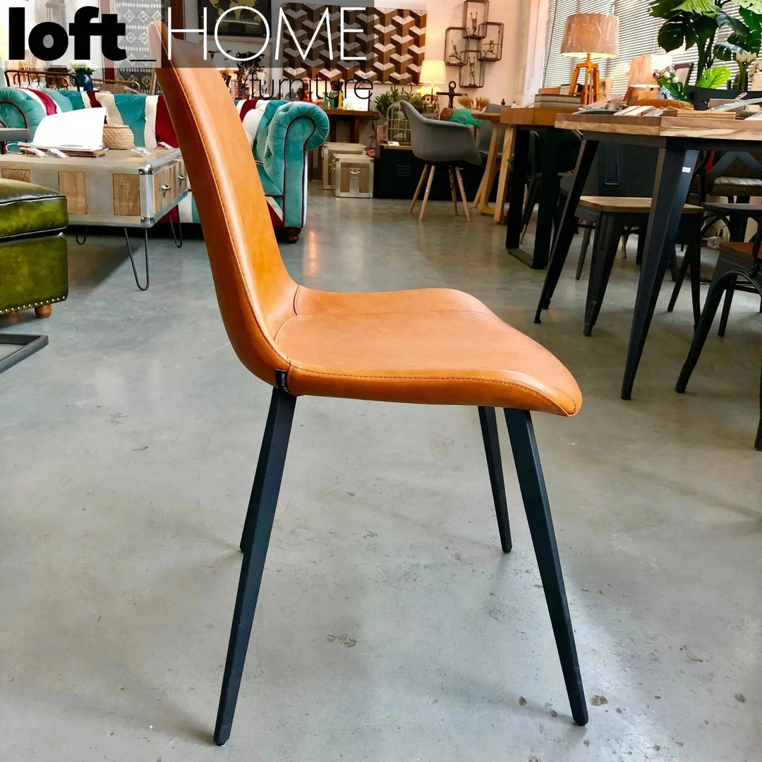 Modern fabric and leather dining chair metal man n1 in real life style.