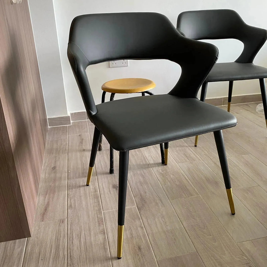 Modern fabric and leather dining chair metal man n2 in panoramic view.