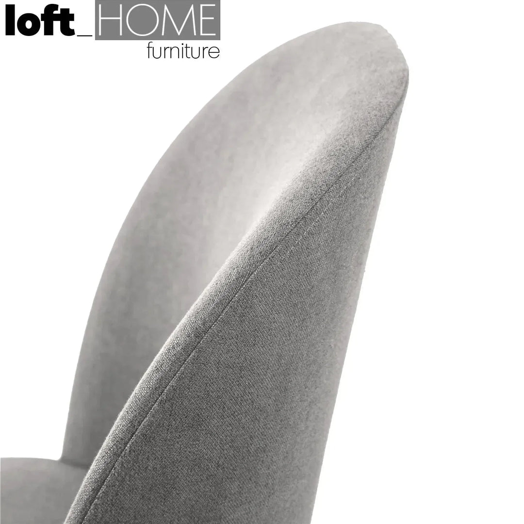 Modern fabric dining chair precious in panoramic view.