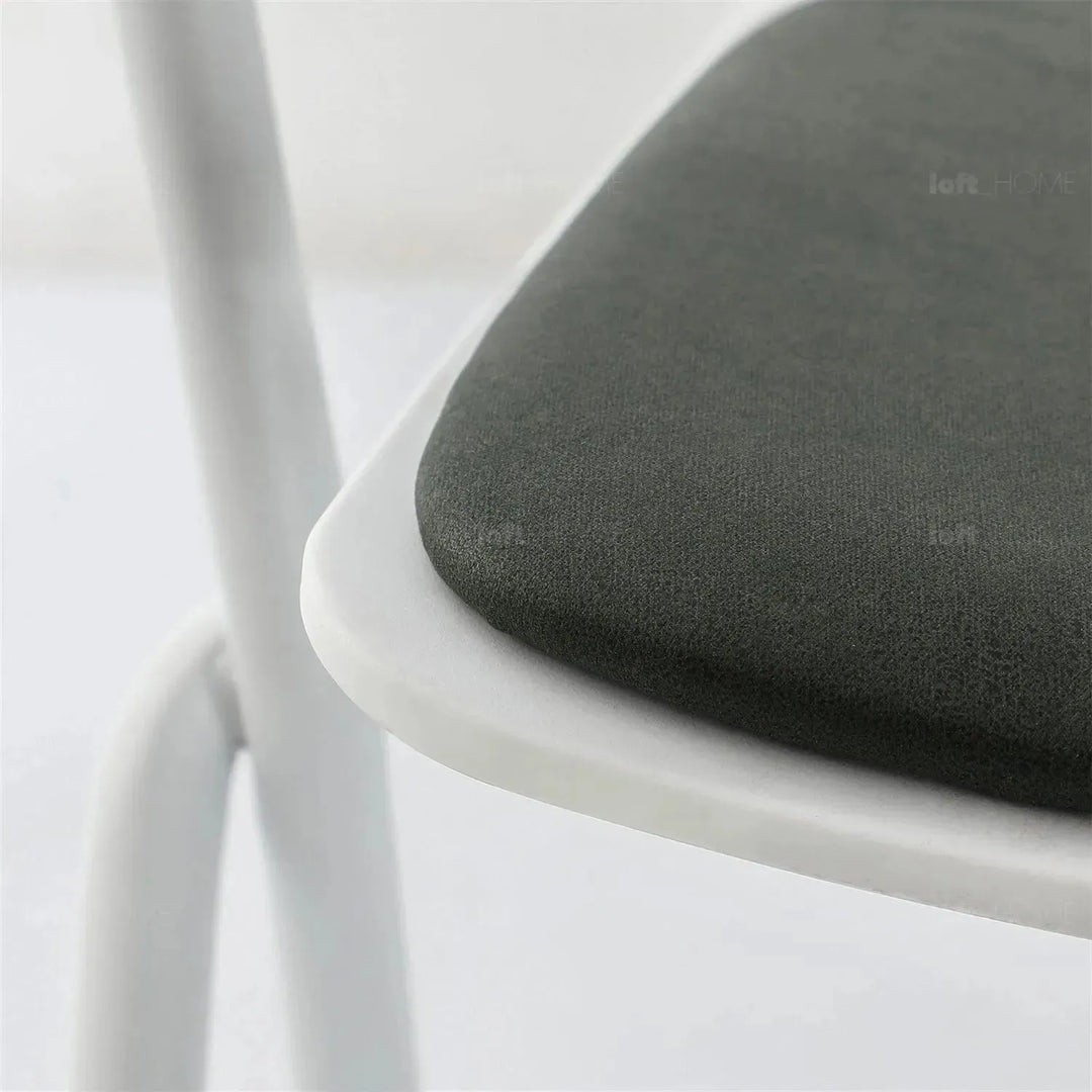 Modern metal dining chair padriac in still life.