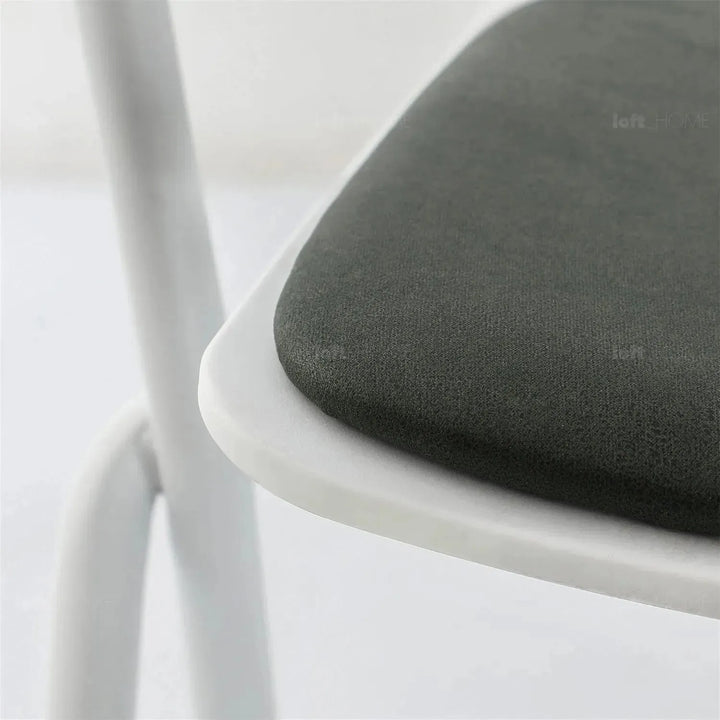 Modern metal dining chair padriac in still life.