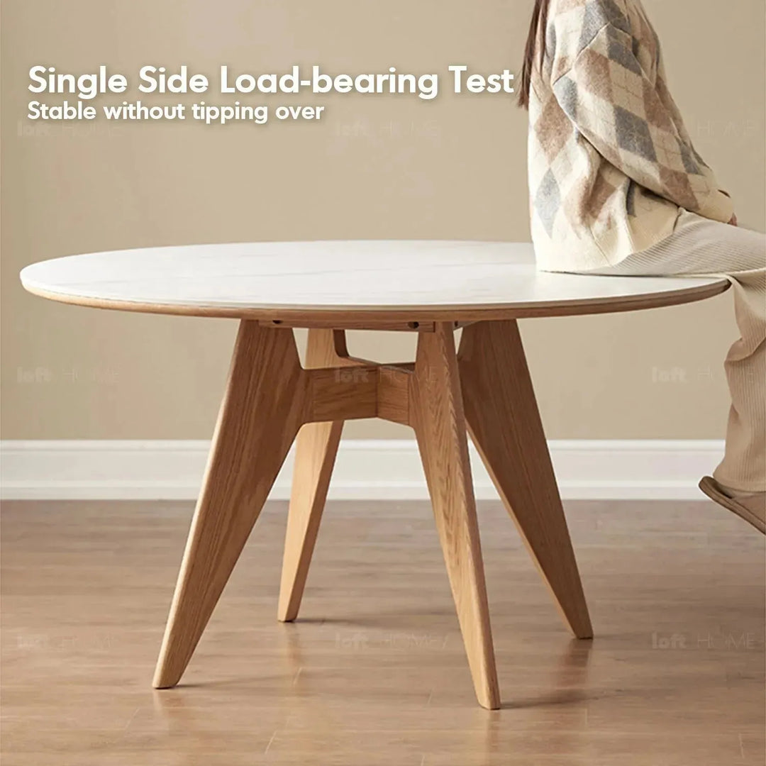 Scandinavian sintered stone round dining table belly situational feels.