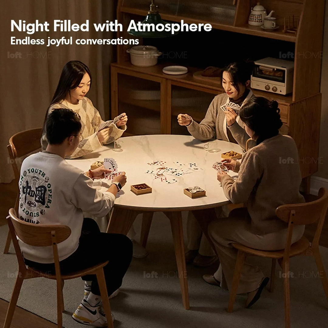 Scandinavian sintered stone round dining table belly in details.